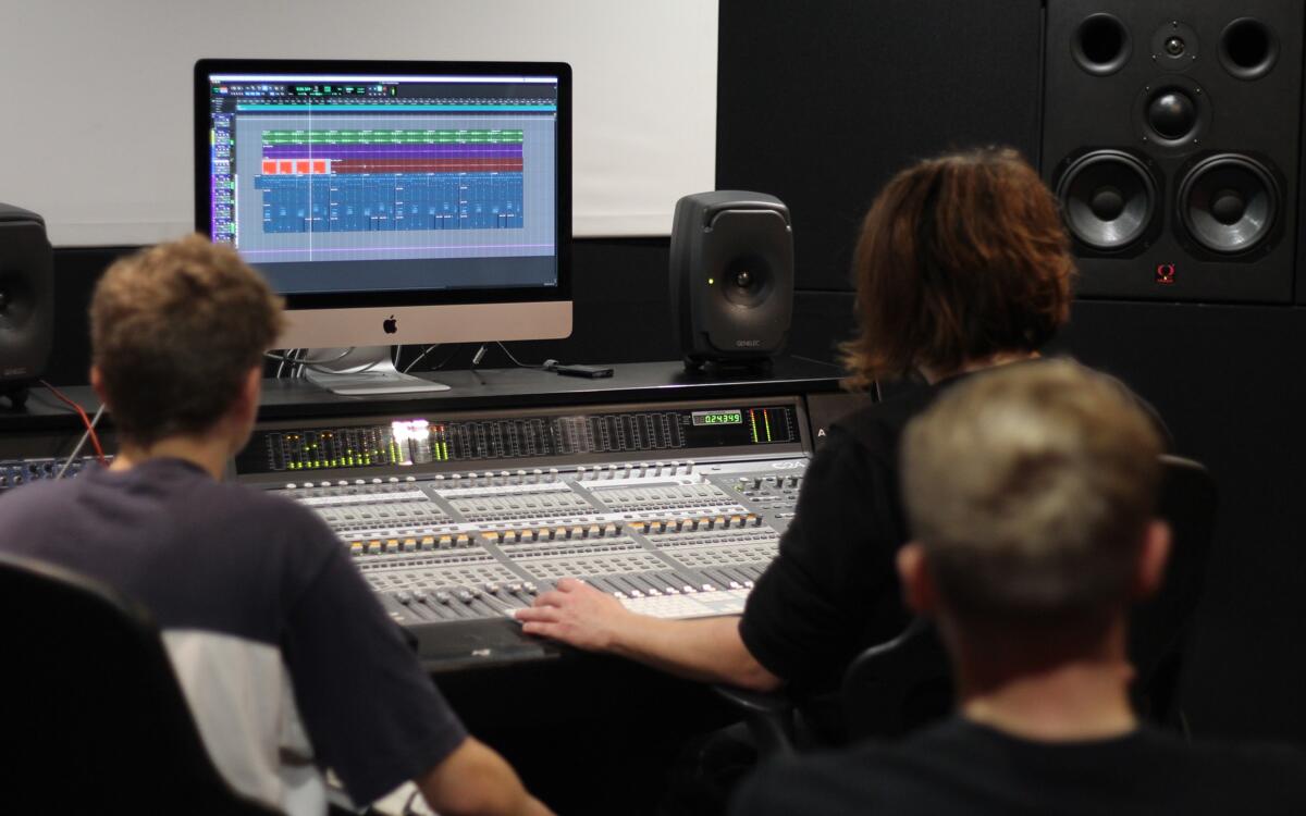 Students and staff using Avid C|24 for sound engineering and music production