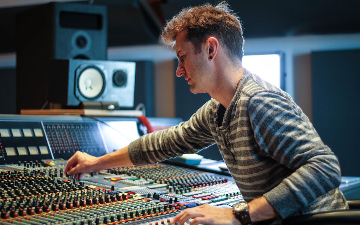 A tutor on our music production courses using the Neve VR in Spirit Studios