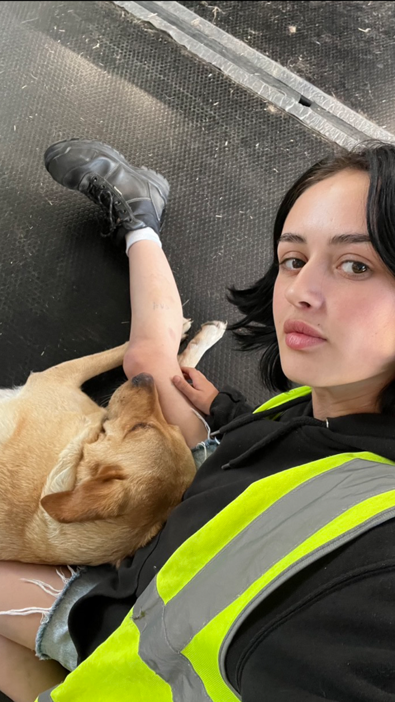 Carla posing with her dog